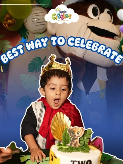 The best way to celebrate is with a special moment. Here, Mr. Giggles stands proudly behind the birthday boy as he gets ready to blow out his candles, making the cake-cutting ceremony even more memorable.