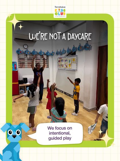 We're not a daycare because our focus is on intentional, guided play. Our mascot Blue the dog represents the structured fun that leads to real skill development.