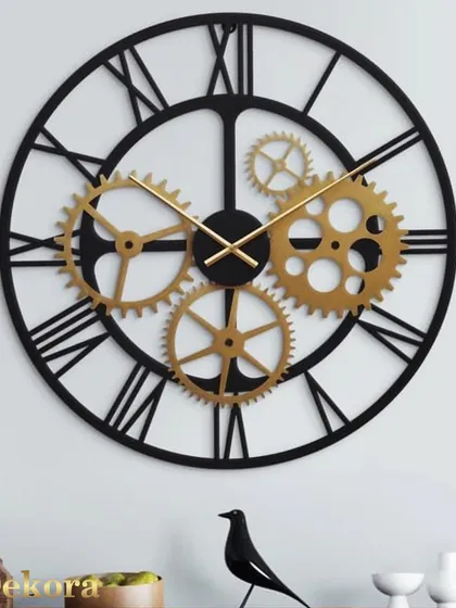 For a touch of industrial chic, this large wall clock features exposed golden gears on a black metal frame, making it a bold statement in a modern office or home.