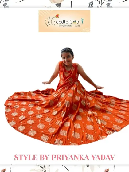 A full view of the custom orange printed dress, designed with a beautiful flare. This outfit is made from a lightweight, breathable fabric, ensuring comfort for all-day wear during celebrations.