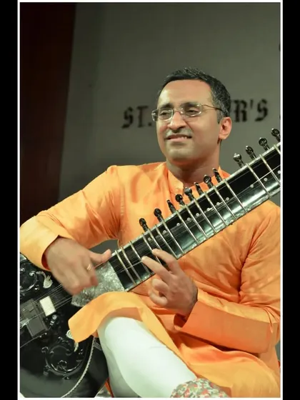 A pleasant moment on stage during a school concert in Gurgaon. I tailor my performances to be lively and accessible for a younger audience.