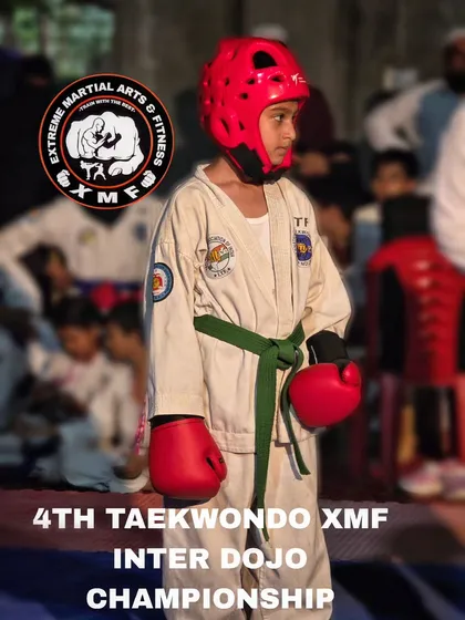 A young champion in his gear at our Inter-Dojo competition, ready to compete.