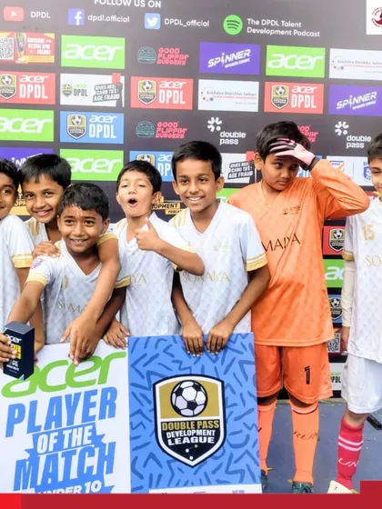 The victorious U-10 team celebrates their win in the DPDL, showcasing the future stars of our academy.
