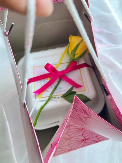 Various examples of my gift wrapping, showing different combinations of ribbons, flowers, and bags to suit any occasion.