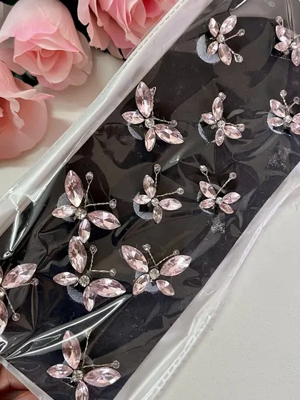 These baby pink butterfly clips are perfect for a soft, feminine look. They are great for bridesmaids too.