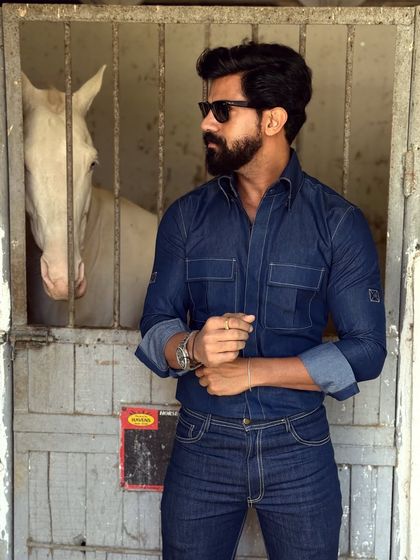 A rugged yet refined denim-on-denim look. Our custom denim shirt and bootcut jeans are perfect for a day outdoors, offering both style and durability.