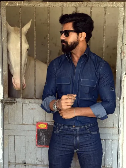 A rugged yet refined denim-on-denim look. Our custom denim shirt and bootcut jeans are perfect for a day outdoors, offering both style and durability.