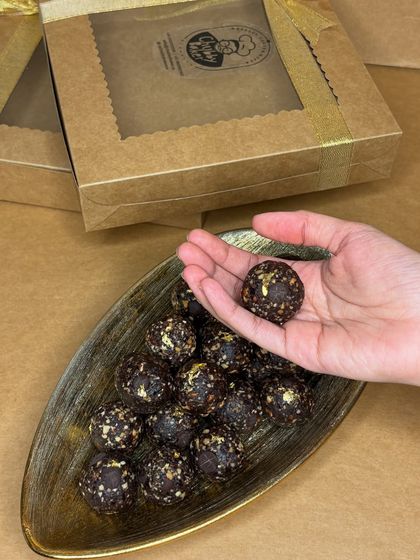 My Belgian Chocolate Roasted Almond Ladoos, finished with a touch of edible gold. These are a luxurious yet healthy treat, packed with protein and made with only raw, natural ingredients.