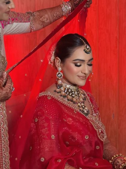 A touching moment as the bride's mother helps with the veil. These are the memories I help create, ensuring the bride looks perfect for every precious second.