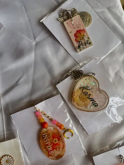"Rise" and "Karma" keychains, two more unique designs from the final sale stock.