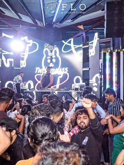 A view from the dance floor at Flo, Bangalore. You can see my custom visuals on the screen while the crowd is fully engaged.