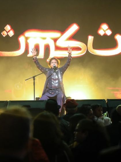 Welcoming the New Year with a roar. Our lead vocalist commands the stage at the Eastern Metropolitan Club, with our name shining bright.