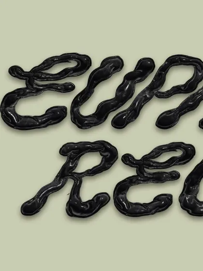 Another detail of the custom "Euphoric Recall" lettering. This view shows more of the word, emphasizing how the letters flow together to create a cohesive and visually strange typographic piece.