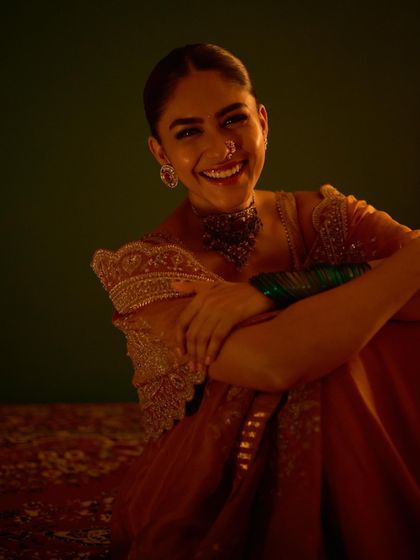 A radiant, smiling portrait that captures the joyful spirit of the festival.