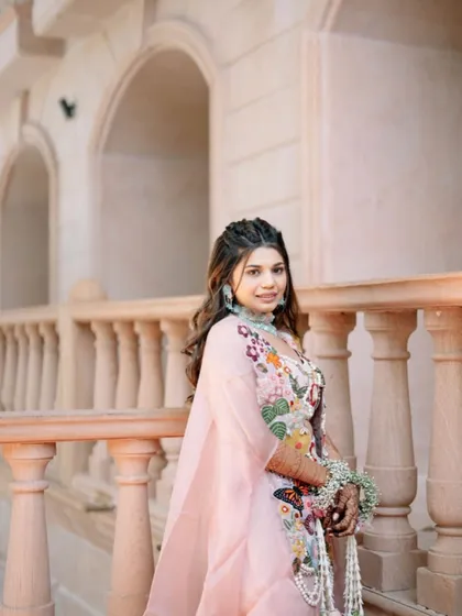 Another angle of the braided Haldi hairstyle, showing its versatility and timeless appeal.