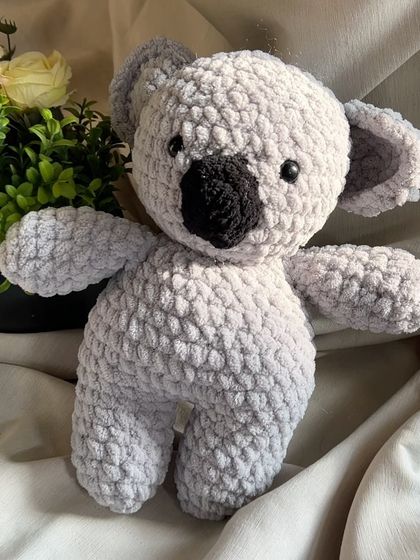 This sweet Koala toy is made from soft grey chunky yarn. It's a perfect, huggable gift for animal lovers of all ages.