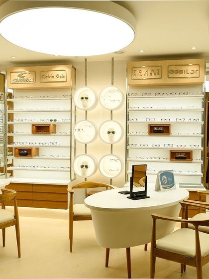 The optical retail section within Dr. Agarwal's Eye Hospital. We designed this space with bright, even lighting and clean display systems to create a functional and pleasant environment for selecting eyewear.