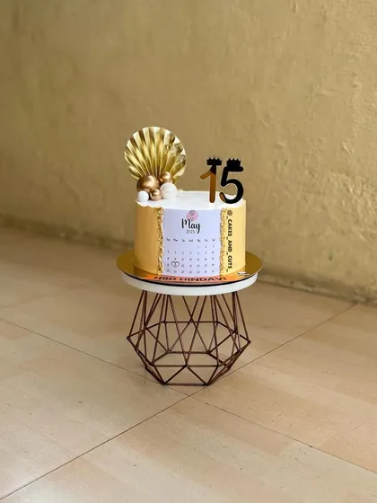 A clean, professional shot of the 15th birthday calendar cake.