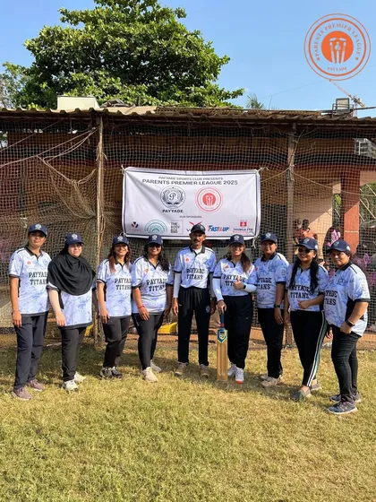 The Payyade Titans women's team poses for a group photo in front of the Parents Premier League banner. This shows the team spirit and pride of the participating teams.