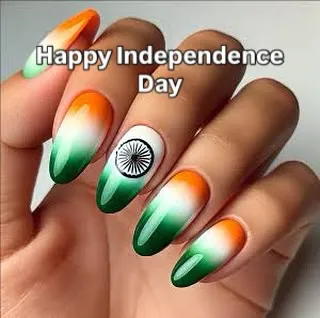A patriotic design perfect for Independence Day. These nails feature the Indian tricolor in an ombre style with the Ashoka Chakra on the accent nail.