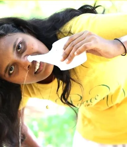 A student practices Jala Neti, a traditional yogic cleansing technique. In our Shat Kriya workshops, I guide you through this process to help clear the nasal passages and improve respiratory health.