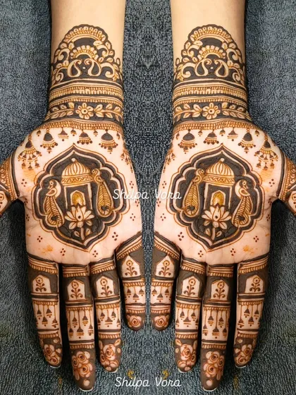 A symmetrical shot of the Gangour 'kalash' design, a symbol of abundance and prosperity.