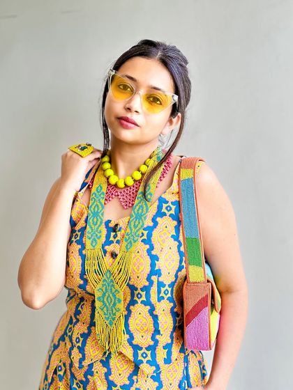 A full view of the accessory-heavy look. The key is to have fun and not be afraid to mix colors and textures.