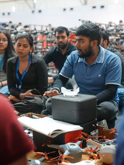 A team briefing before a major show. Collaboration is key to our success, and every member of the BotLab family plays a crucial role in bringing our ambitious visions to life.