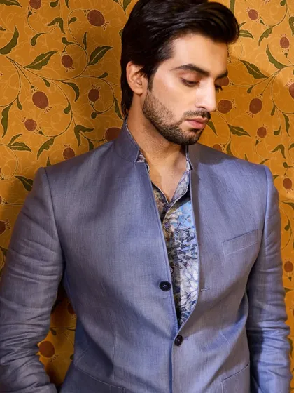 A closer look at the blue linen jacket, paired with a printed shirt. This shows how my pieces can be styled in different ways to suit individual tastes.