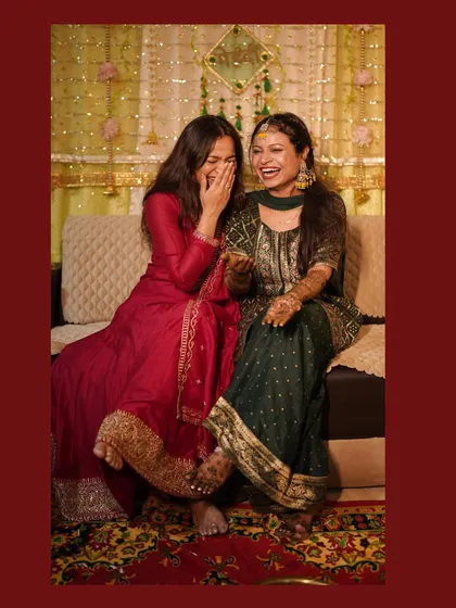 This is what I mean by 'emotional storytelling'. The unrestrained laughter between the bride and her friend during the Mehendi function is a moment of pure, genuine connection. These are the memories that truly matter, long after the henna has faded.