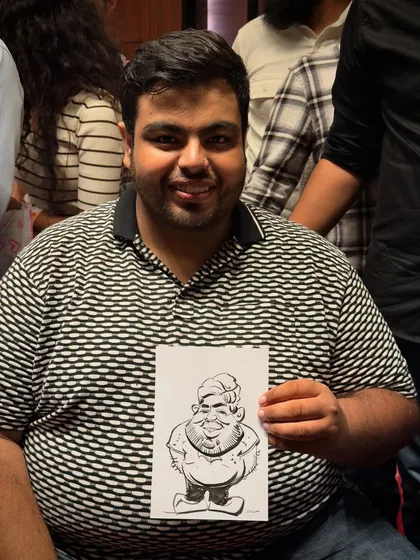 This guest was a great sport, and I had fun capturing his cheerful demeanor in this full-body caricature. These quick portraits are a fantastic memento for event attendees.
