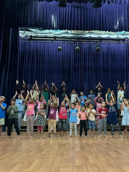 Young participants of our Ramana Summer Camp on stage at the Heritage Auditorium. We nurture cultural values and self-awareness from a young age, providing every child with the opportunity to perform and express themselves with confidence.