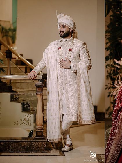 A classic portrait of the groom looking sharp in his sherwani on the wedding day. I make sure the groom gets his own moments to shine.