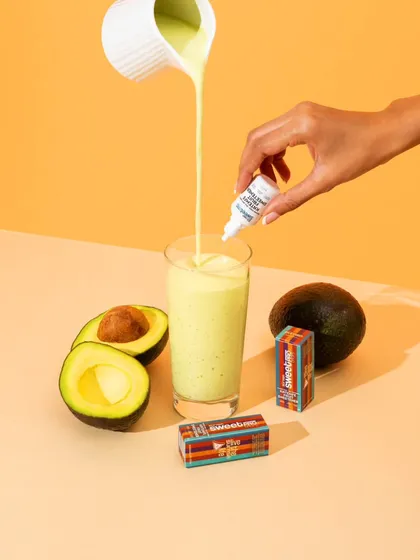 We used a monochromatic color scheme to create a sophisticated yet vibrant look for this health product. The action of pouring the smoothie and adding the drops shows the product in use, making it easy for customers to understand.