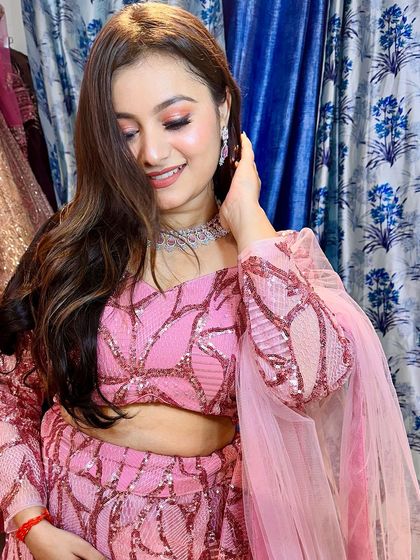 A closer look at the pretty pink sequin lehenga. The fabric has a beautiful shine, and the fit is designed to be flattering.