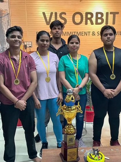 Celebrating the winners of our team. Here we are with our medals and the overall trophy at Vis Orbit gym.