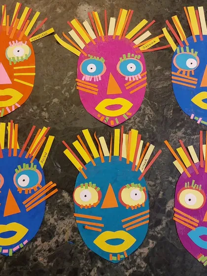 A collection of vibrant African masks made by my 4 to 7-year-old students. This was a fun and educational craft for our "Project Africa" theme.