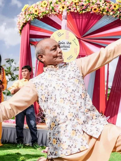 A guest showing off his dance moves, capturing the high-energy vibe of the Haldi party.