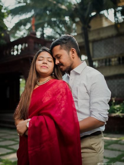 A moment of quiet intimacy and trust. The bride closes her eyes and leans into her partner's embrace, capturing a feeling of complete comfort and love.