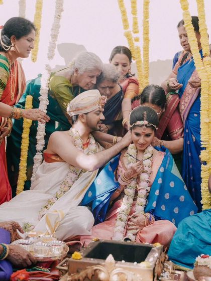 The elders of the family blessing the couple during the mangalsutra ceremony, a moment rich with emotion and tradition.