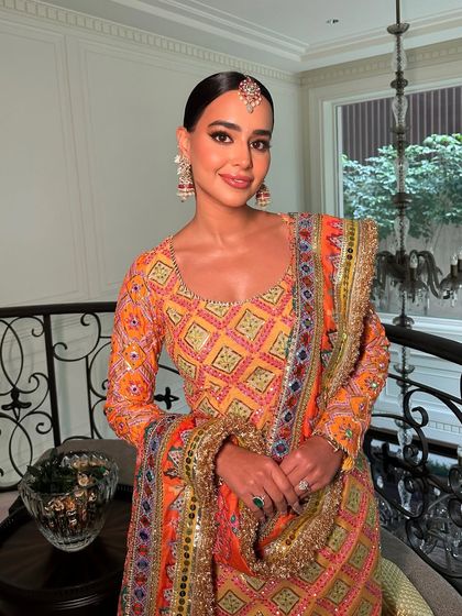 A close-up of the glam mehendi look, showing the flawless skin and the defined eyes that make a statement without being overpowering.