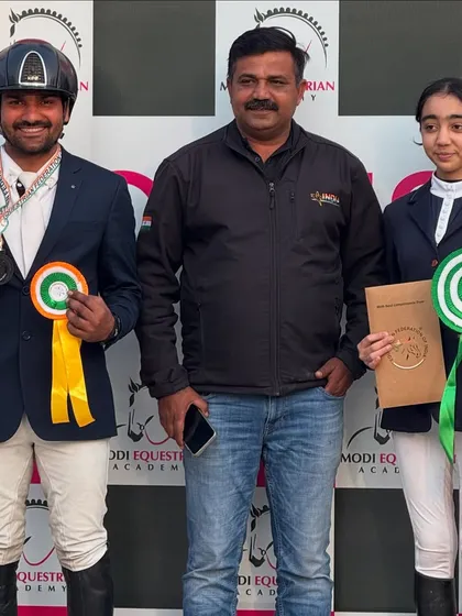Success is a team effort. Our riders celebrating their wins with a coach, showcasing the supportive community and expert guidance that is the backbone of Team VEA.