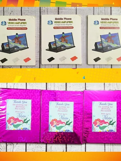 The mobile screen amplifiers are a unique and modern gadget. For this order, they were wrapped in mermaid-themed paper.