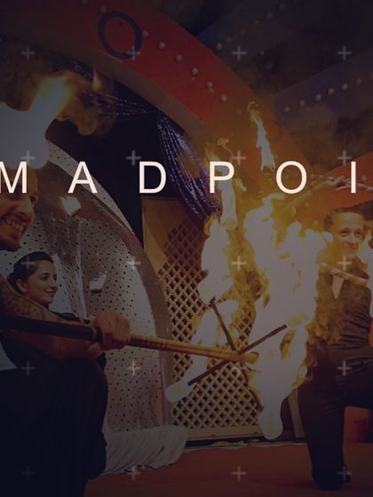 A signature shot of my team in action, showcasing the art of fire staff manipulation. For weddings, we can create a powerful entry sequence or a full-length choreographed performance that tells a story with fire.