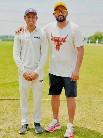 Celebrating with Noor Mohammad and Nikhil Malik after their brilliant centuries in a tournament match.