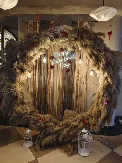 Another angle of the pampas grass Valentine's ring, showing the little heart details and birdcage props I added.