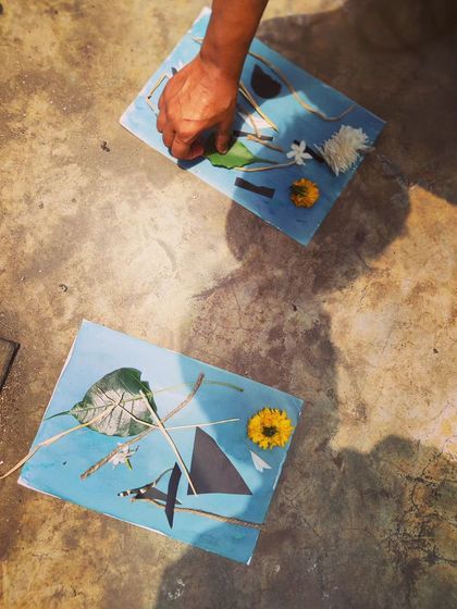 Preparing for a Cyanotype printing session. We use natural objects like leaves and flowers, along with paper cutouts, to create images using only sunlight. It’s a magical process of painting with light and shadow.
