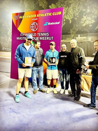 Celebrating a doubles victory at the ITF World Tennis Masters Tour in Meerut. Success is best when shared.