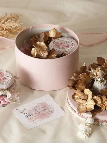 Celebrate your little one’s arrival with our beautiful baby announcement hampers. This one includes a jar of rose almonds and a jar of brownie bites.