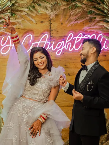 The cutest couple, being themselves at their reception.